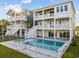 Stunning elevated home with swimming pool, outdoor stairway, and multiple decks for luxury living at 4843 Williams Island Dr., Little River, SC 29566