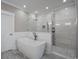 Spa-like bathroom with soaking tub and glass enclosed shower at 4843 Williams Island Dr., Little River, SC 29566