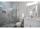 Bathroom with a glass enclosed shower and a white vanity at 4843 Williams Island Dr., Little River, SC 29566