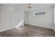 Bright bedroom featuring neutral paint, trim and wood-look floors at 4843 Williams Island Dr., Little River, SC 29566