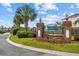 Entrance sign to Paradise Island features lush greenery and manicured landscape at 4843 Williams Island Dr., Little River, SC 29566