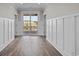 Hallway with sliding glass doors and view of the community at 4843 Williams Island Dr., Little River, SC 29566