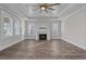 Living room featuring a fireplace and lots of natural light at 4843 Williams Island Dr., Little River, SC 29566