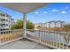 Balcony with views of the pond and nearby waterfront condos, great for relaxing at 4875 Luster Leaf Circle # 202, Myrtle Beach, SC 29577