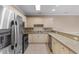 Spacious kitchen with stainless steel appliances, lots of cabinets, and sleek countertops at 4875 Luster Leaf Circle # 202, Myrtle Beach, SC 29577