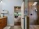 Bathroom with granite counters, view of bedroom and walk-in shower at 489 Harbour View Dr., Myrtle Beach, SC 29579