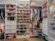 Custom walk-in closet with built-in shelving, drawers, and ample storage for shoes and clothes at 489 Harbour View Dr., Myrtle Beach, SC 29579