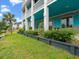 Spacious backyard featuring lush greenery, a well-kept lawn, and a charming exterior of the home at 489 Harbour View Dr., Myrtle Beach, SC 29579