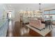 Bright kitchen with stainless steel appliances, island, and adjacent dining area with bench seating at 489 Harbour View Dr., Myrtle Beach, SC 29579