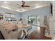 Cozy living room with hardwood floors, a large sectional sofa, and access to an outdoor deck at 489 Harbour View Dr., Myrtle Beach, SC 29579