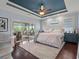 Serene main bedroom with private balcony access, fan, and view to exterior swing at 489 Harbour View Dr., Myrtle Beach, SC 29579