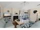 Inviting living room featuring tile floors, comfortable seating, fireplace and sliding glass doors at 490 Ocean Creek Dr. # 8, Myrtle Beach, SC 29572