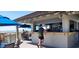 Charming snack bar with a relaxed atmosphere overlooking the ocean, perfect for enjoying refreshments at 490 Ocean Creek Dr. # 8, Myrtle Beach, SC 29572