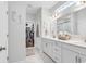 Bathroom boasts double sinks, white cabinets, and a walk-in closet at 500 Canborough Lane, Murrells Inlet, SC 29576