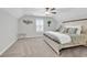 Spacious bedroom with a ceiling fan and lots of natural light at 500 Canborough Lane, Murrells Inlet, SC 29576