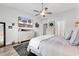 Main bedroom with lots of light, a TV, and neutral colors at 500 Canborough Lane, Murrells Inlet, SC 29576