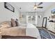 Light filled bedroom with large window and cozy decor at 500 Canborough Lane, Murrells Inlet, SC 29576