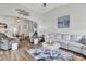 Open-concept living room featuring modern decor and hardwood floors at 500 Canborough Lane, Murrells Inlet, SC 29576
