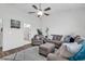 Relaxing living room with a ceiling fan, cozy seating, and access to the bathroom at 500 Canborough Lane, Murrells Inlet, SC 29576