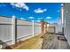 Spacious wood deck with white privacy fence, perfect for outdoor relaxation and entertaining at 504 Lake Shore Dr., Surfside Beach, SC 29575