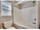 Clean and bright bathroom featuring a shower-tub combination and modern fixtures at 504 Lake Shore Dr., Surfside Beach, SC 29575