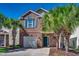 Charming brick home with well-kept yard and palm trees, inviting curb appeal at 504 Lake Shore Dr., Surfside Beach, SC 29575