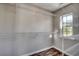 Walk-in closet with wire shelving and natural light from a window at 504 Lake Shore Dr., Surfside Beach, SC 29575