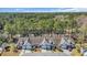 Aerial view of townhomes surrounded by trees at 5042 Forsythia Circle # 5042, Murrells Inlet, SC 29576