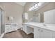 Bright bathroom featuring double sinks, white cabinetry, and a glass-enclosed shower at 5042 Forsythia Circle # 5042, Murrells Inlet, SC 29576