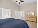 Spacious bedroom with light-colored walls, vaulted ceiling, and private bathroom entrance at 5042 Forsythia Circle # 5042, Murrells Inlet, SC 29576