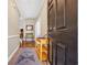 Welcoming foyer with tile flooring, bench seating, and a view of the elegant interior design at 5042 Forsythia Circle # 5042, Murrells Inlet, SC 29576