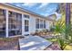 Exterior view of home and sunroom at 5042 Forsythia Circle # 5042, Murrells Inlet, SC 29576