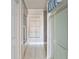 A hallway bathroom featuring a bathtub and a glass shower door at 5092 Harrelson Ave., Loris, SC 29569
