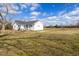 Exterior view of home showing a large grassy area and blue sky at 5092 Harrelson Ave., Loris, SC 29569