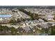 Aerial view of a residential neighborhood with lush landscaping and ponds at 518 Heartland Ct., Murrells Inlet, SC 29576