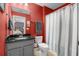 Bathroom with a granite countertop, gray vanity, and a shower with a white and gray curtain at 518 Heartland Ct., Murrells Inlet, SC 29576