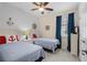 Nautical-themed bedroom with twin beds, a ceiling fan, and coastal decor at 518 Heartland Ct., Murrells Inlet, SC 29576