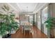 Elegant dining room with hardwood floors, stylish decor, and ample natural light at 518 Heartland Ct., Murrells Inlet, SC 29576