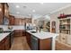 Gourmet kitchen featuring granite countertops, stainless steel appliances, and a stylish backsplash at 518 Heartland Ct., Murrells Inlet, SC 29576