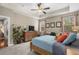 Inviting main bedroom featuring a trey ceiling, neutral walls, and a ceiling fan for added comfort at 518 Heartland Ct., Murrells Inlet, SC 29576