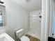 Bathroom featuring a shower with tile surround, offering a clean and updated aesthetic at 530 Yarboro St., Mullins, SC 29574