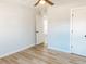 Bedroom featuring neutral flooring, ceiling fan, and multiple entryways at 530 Yarboro St., Mullins, SC 29574