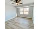 Bedroom with natural light, ceiling fan, and neutral flooring at 530 Yarboro St., Mullins, SC 29574