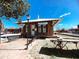 Exterior view of the historic Mullins, SC train depot with benches and landscaped areas at 530 Yarboro St., Mullins, SC 29574