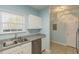 Modern kitchen with granite countertops, stainless steel dishwasher, and ample cabinet space at 5801 Oyster Catcher Dr. # 1614, North Myrtle Beach, SC 29582