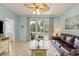 Charming living room with sliding glass doors to the patio and adjacent to the kitchen at 5801 Oyster Catcher Dr. # 1614, North Myrtle Beach, SC 29582