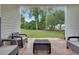 Relaxing patio area with outdoor seating and a view of the lush green lawn at 5801 Oyster Catcher Dr. # 1614, North Myrtle Beach, SC 29582