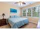 Cozy bedroom with natural light from the window and carpet floors at 5801 Oyster Catcher Dr. # 724, North Myrtle Beach, SC 29582