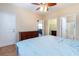 Comfortable primary bedroom with a dresser, walk in closet, and attached bathroom at 5801 Oyster Catcher Dr. # 724, North Myrtle Beach, SC 29582