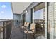 Balcony with seating, offering a relaxing space for enjoying the outdoor views and fresh air at 5905 S Kings Hwy. # 318B, Myrtle Beach, SC 29575